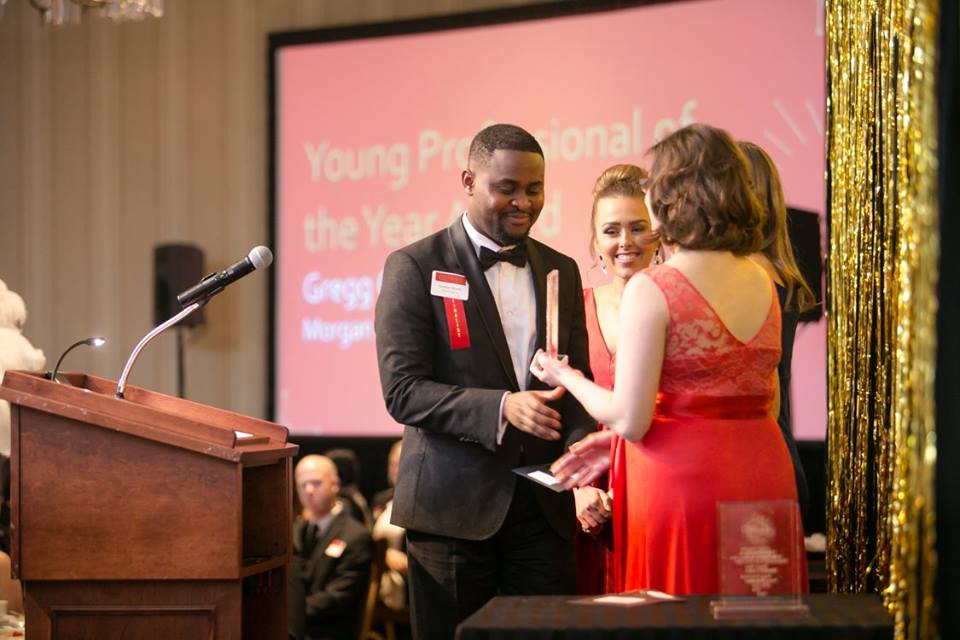Ghana-born Godson Sowah receives the Young Professional of the Year Award from the Saint Paul Area Chamber of Commerce. Sowah is an Advisory Manager at Ernst & Young and serves as the chairman of the annual Mshale African Awards Judges panel. Photo: Courtesy St. Paul Area Chamber of Commerce