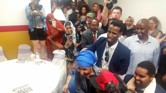Ilhan Omar is mobbed by supporters as she enters the victory party celebration. She toppled the longest serving legislator in Minnesota on Tuesday, August 9 2016 to proceed to the November election. Photo: Tom Gitaa