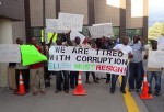 Demonstrators from the group Movement of Liberians Against Corruption