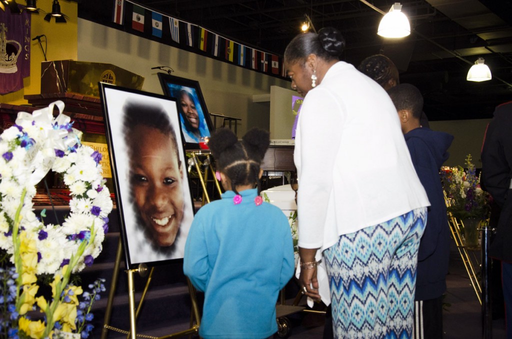 Mourners stare at the smiling photo of 10-year-old Barway Collins during an emotional funeral service at Shiloh Temple International Ministries in Minneapolis on May 2, 2015, exactly three weeks after his body was found on the Mississippi River on Saturday, April 11. His father, Pierre Collins, was taken into custody two days after Barway was found and charged with the murder of his son. Photo: Kaamil Haider/Mshale