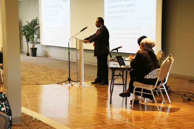 Somali American Parent Association executive director, Mohamed Mohamud speaking at the East African immigrant mental health conference his organization hosted in conjunction with the Minnesota Dept. of Health. Photo: Faiza Abbas Mahamud/Mshale