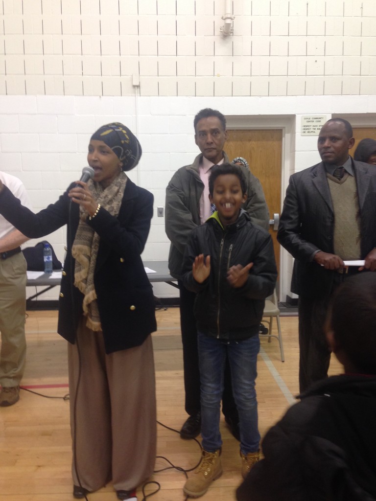 Ilhan Omar, candidate for Minnesota House District 60B, speaking to the caucus after voting concluded. Photo: Faiza Abbas Mahamud/Mshale