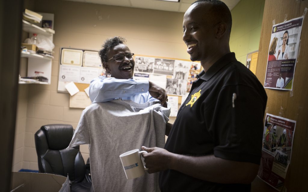 Abdi Mohamed, community liaison for the Hennepin County Sheriff’s office, has done outreach in 43 cities in Minnesota and elsewhere.”I am busy,” he said at Brian Coyle Community Center in Minneapolis. “I go out every day.” Photo: Courtesy Star Tribune