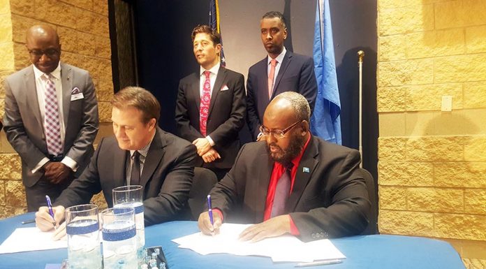 North Central and Maakhir become sister universities Puntland Education Minister in Minnesota