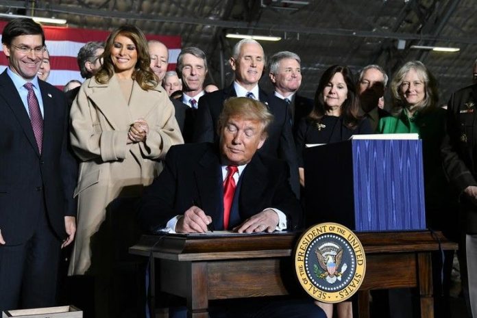 Trump Signing DED Law on Dec 20 2019 Trump signing law giving Liberians citizenship