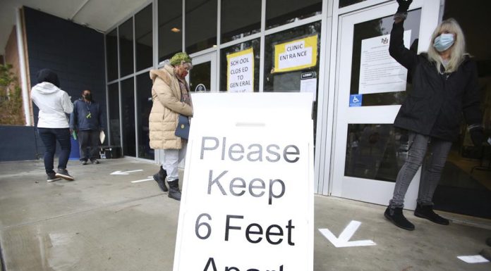 CDC drops quarantine, distancing recommendations for COVID