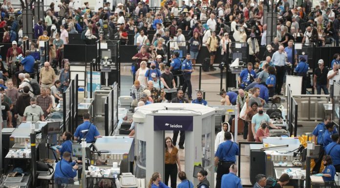 Holiday air travel tops pre-pandemic levels for the 1st time