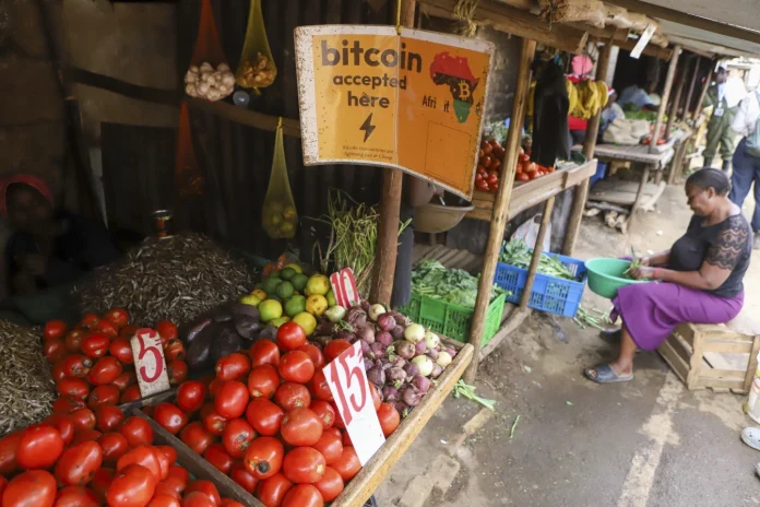 Roadside Kiosk that accepts Bitcoin in Kibera by Andrew Kasuku of AP