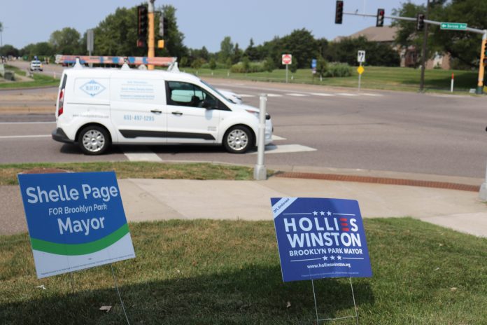 Hollies and Shelle Yard Signs on Primary Election Day 8-11-26 by Tom Gitaa - Mshale Newspaper