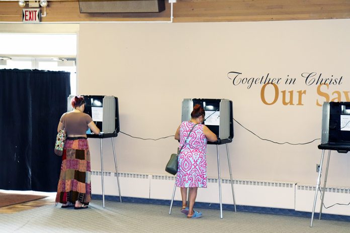 Voters Filling Out Ballots Morning of 8-11-26 MN Primary Election at Our Saviors Church in Brooklyn Park