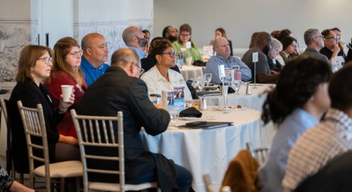 Attendees seated at tables during the November 2023 Brooklyn Park Business Forward Forum