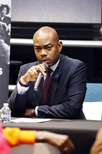 Republican support for Folk heats up Hennepin County attorney race ahead of north Minneapolis debate 1 Cedrick Frazier speaks into a microphone during the Hennepin County attorney debate in north Minneapolis