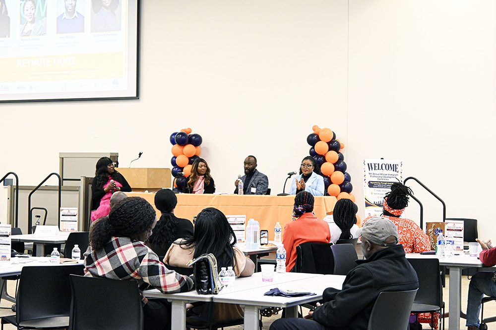 CICA conference strives to inspire African immigrants to turn their education, experience and connections into opportunities for growth and leadership 3 Wide Pan of Harriet KeruboAlex MasikaKaren Fomafung with Audience
